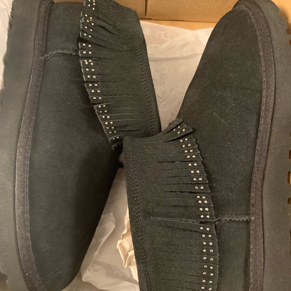 Black Ugg low moccasin style boots. Size 9